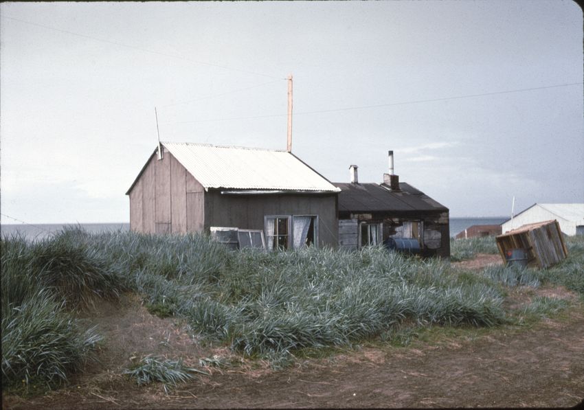 A hole had to be dug in the permafrost to bury the large box which was a trap for grey waste water.